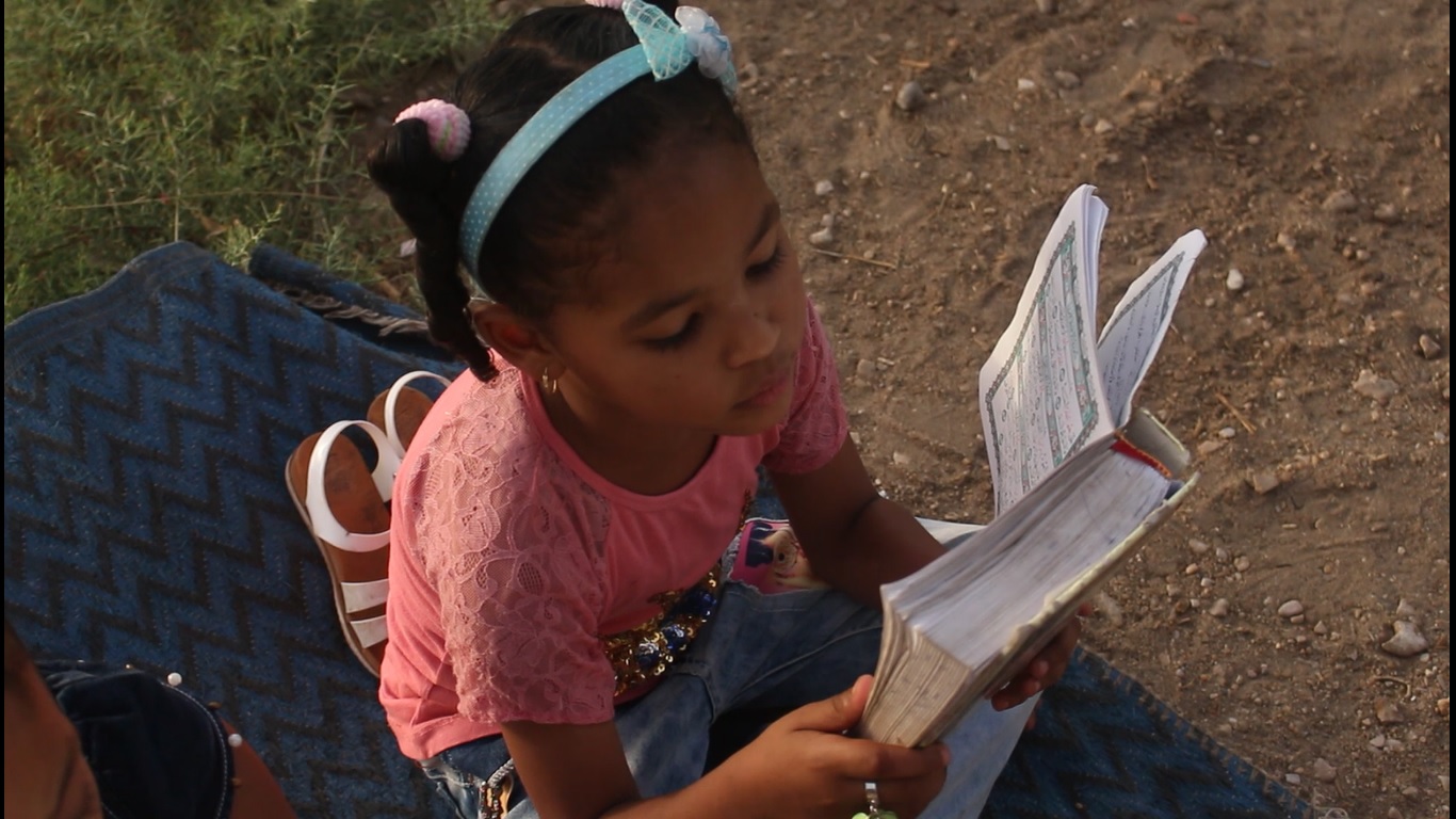 تعليم أطفال البعيرات القرآن