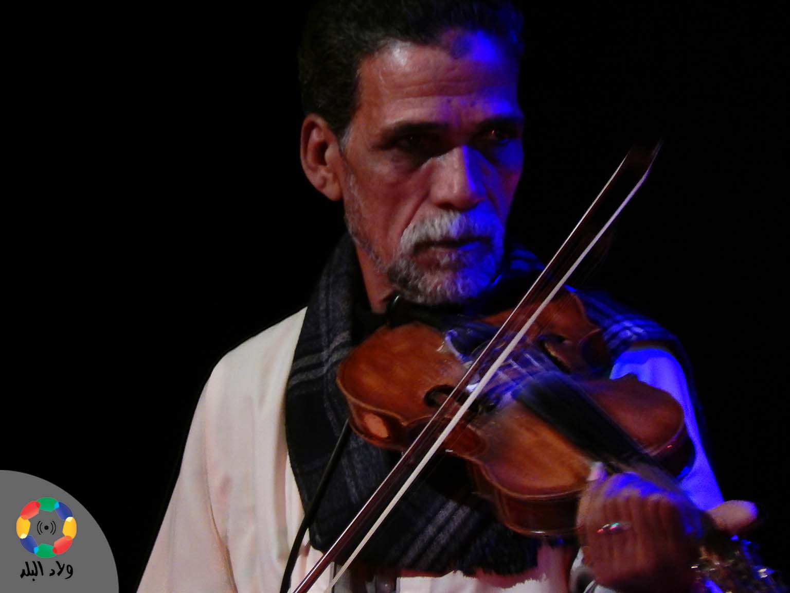 عازف الكمان في فرقة الأسيوطي، حفل جزويت الإسكندرية