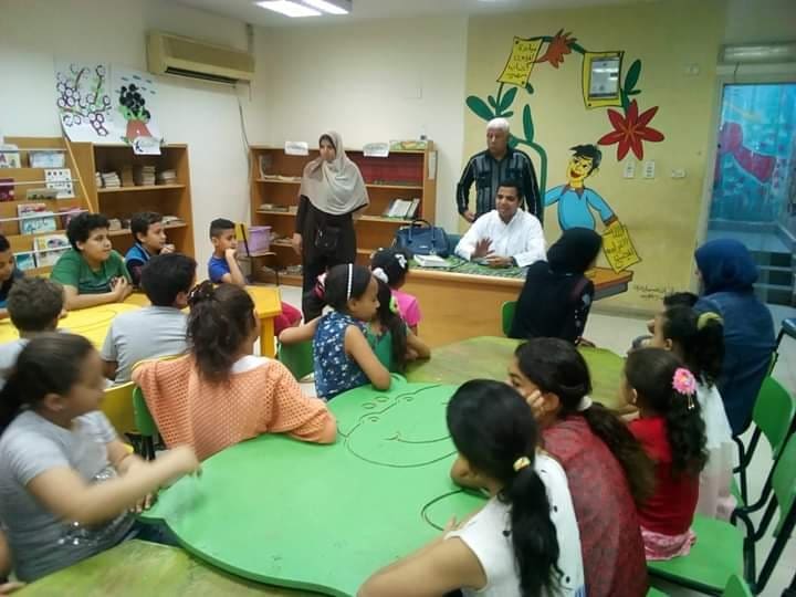 محاضرة بمكتبة الفيوم العامة - تصوير القسم الإعلامي بالفرع