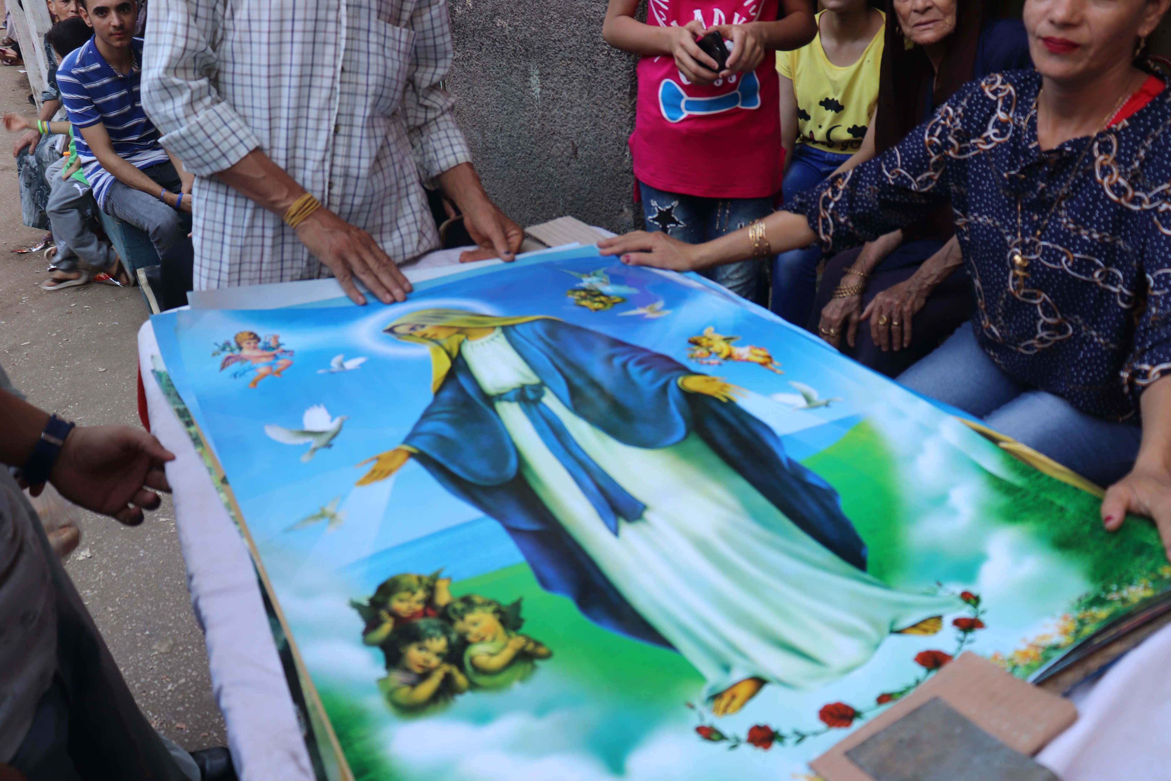 توزيع صور العذراء خلال الاحتفالات