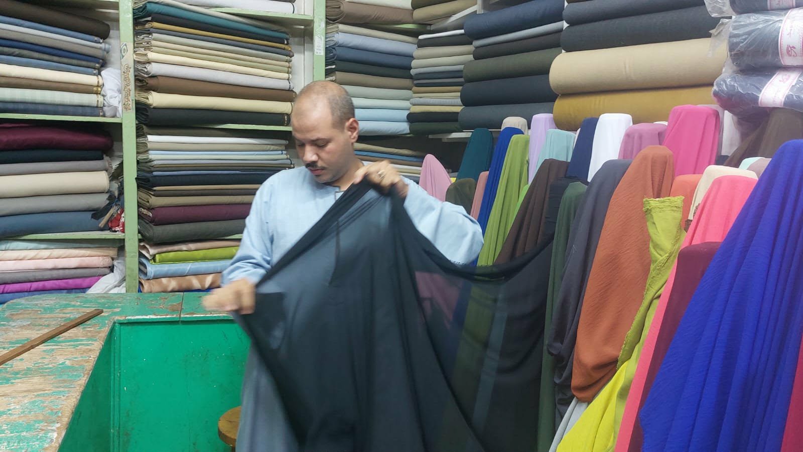 شارع الأقمشة بالمنيا- تصوير أسماء منتصر