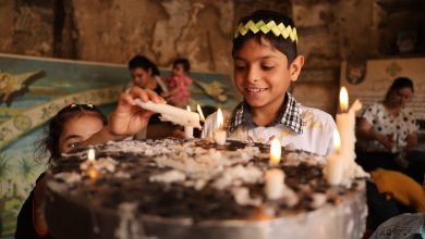 احتفالات أحد السعف في كنيسة دير الجنادلة في أسيوط.. تصوير: أحمد مصطفى