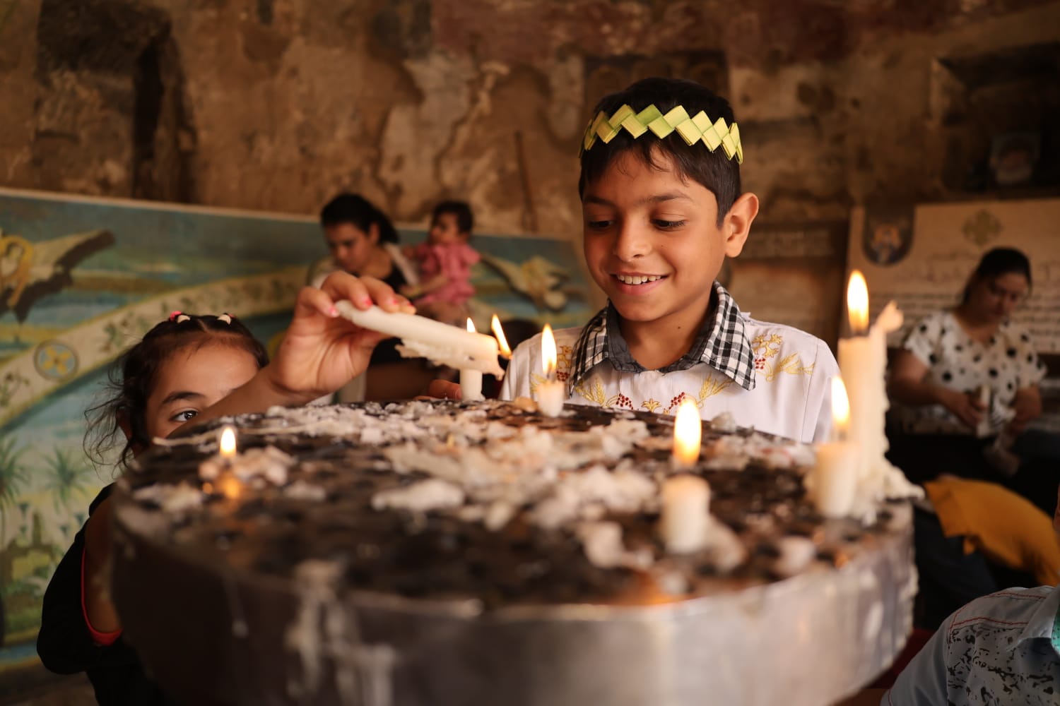 احتفالات أحد السعف في كنيسة دير الجنادلة في أسيوط.. تصوير: أحمد مصطفى